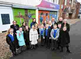 Front Street shutter art celebrates Stanley civic pride